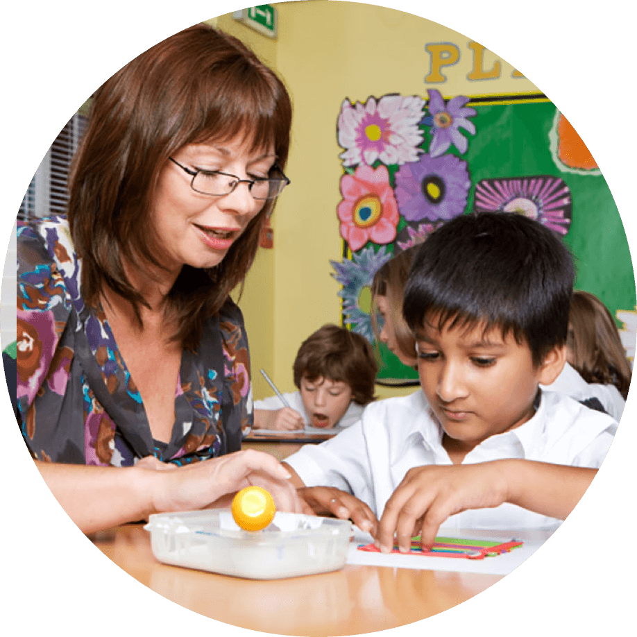 Teacher helping Student